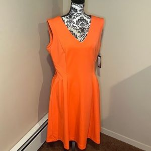 Stunning orange dress with gold zipper detail